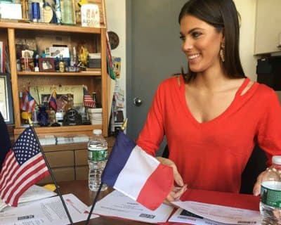 Iris Mittenaere visits the Latino Commission on AIDS and Smile Train