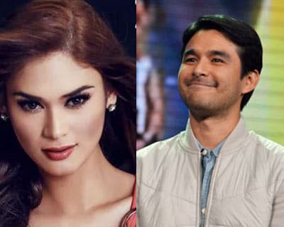 ABS-CBN news personality Atom Araullo welcomes Pia Wurtzbach with a kiss