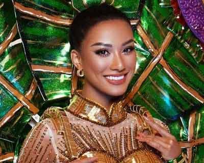 Vietnam’s Nguyễn Huỳnh Kim Duyên’s costume represents Bánh tét lá câm for Miss Universe 2021
