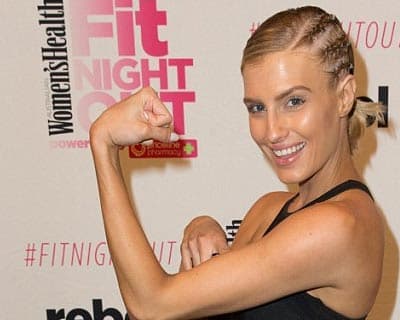 Erin Holland flaunts her toned physique and fit biceps