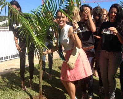 Jamie Herrell planting trees as part of her Beauty with a Cause mission in Reunion Island