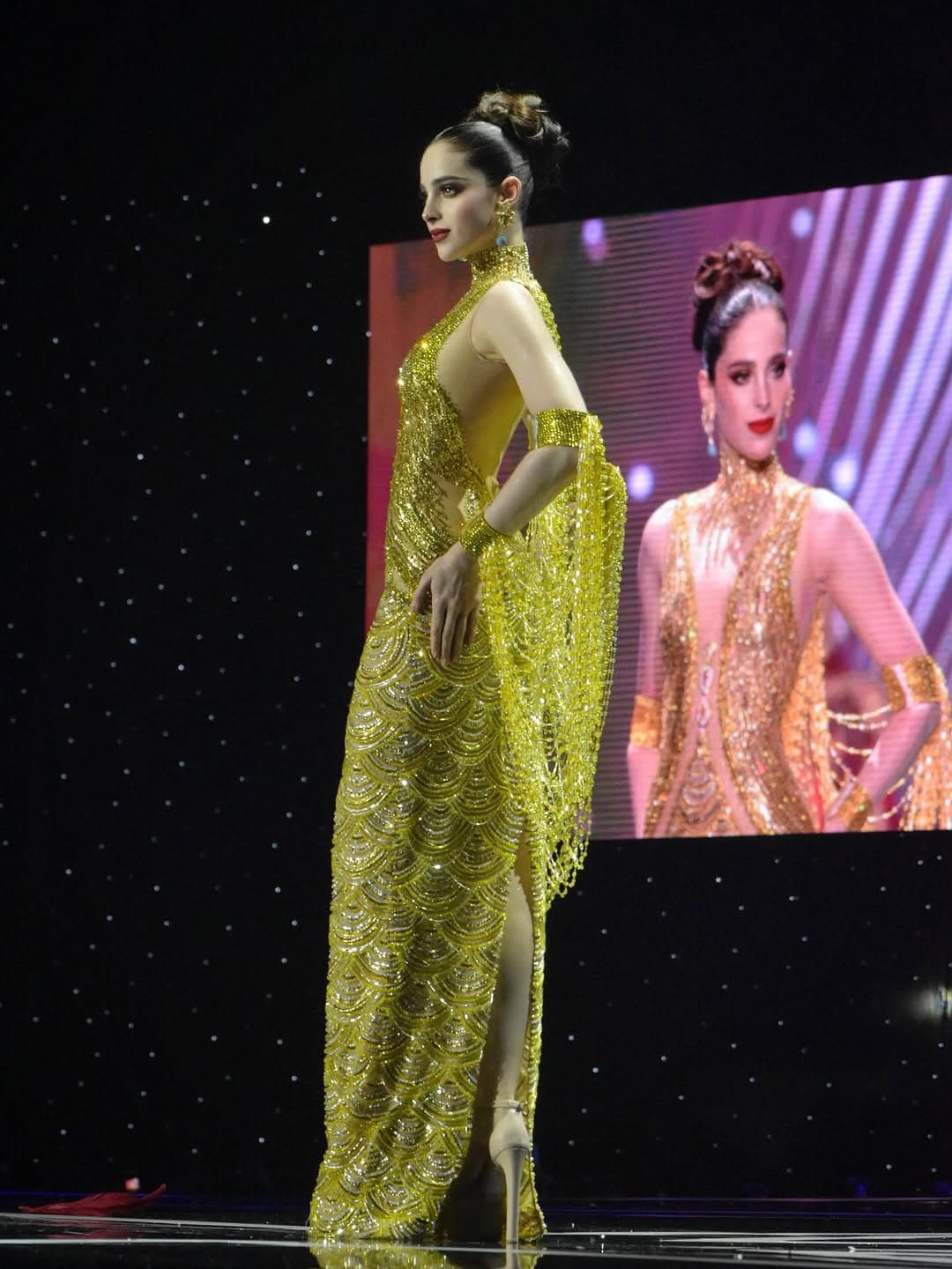Fátima Bosch in the maize-gold evening gown at the Miss Universe 2025 preliminary